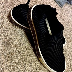 Black Slip-On shoes by Bernie Mev New York.